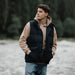 White duck down vest by MANDOTOS, a men's three-proof jacket with insulated, lightweight design for warmth and protection.