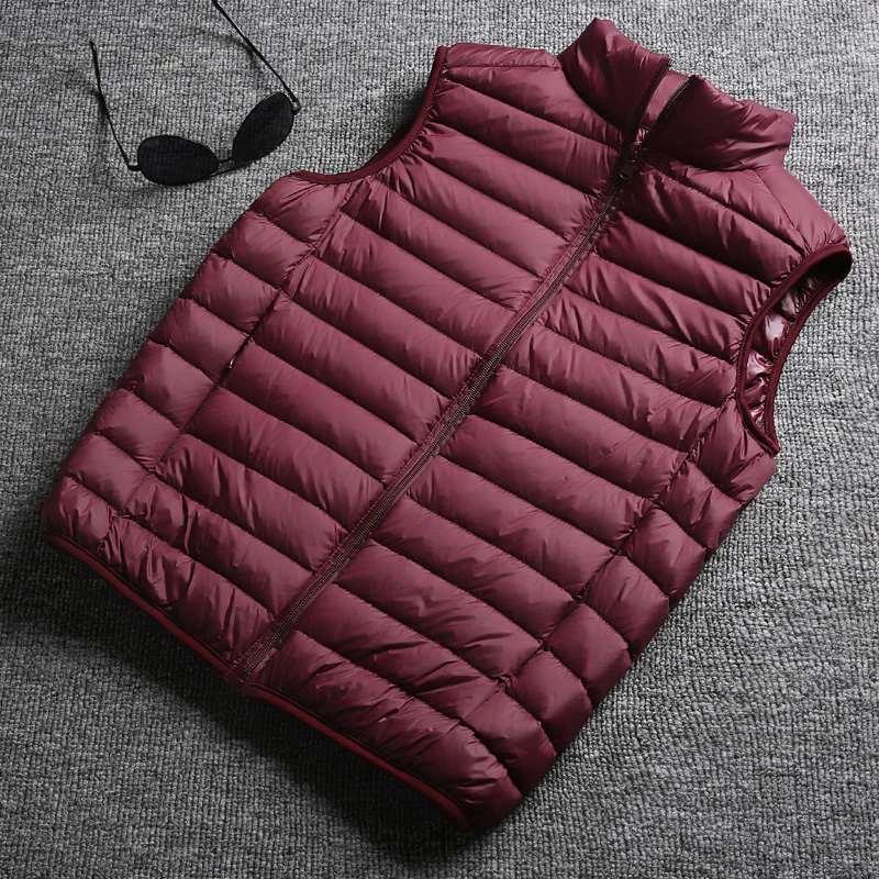 Mandotos white duck down ultralight sleeveless vest, designed for warmth and effortless style in winter.