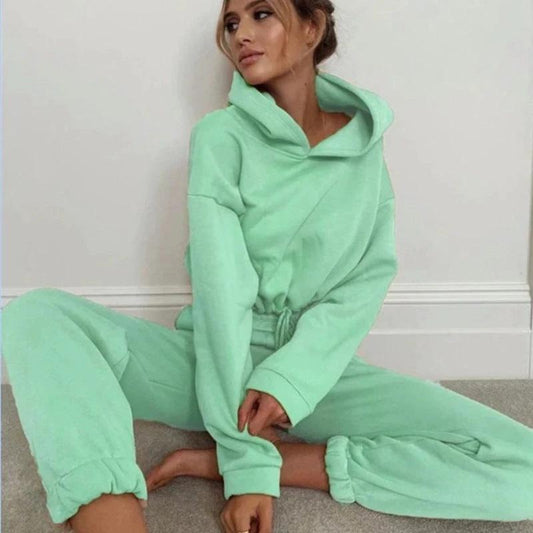 Women's 2-piece jogging suit by MANDOTOS with sexy long sleeve hoodie and matching joggers, casual athletic wear for women.