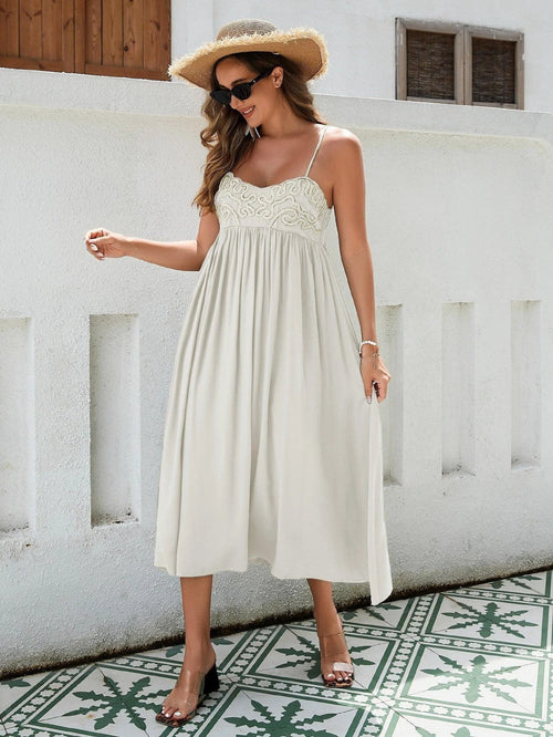 Women's Bohemian Maxi Dress by MANDOTOS featuring breathable rayon fabric, embroidered bust, elastic back, and flowy skirt in black, white, and green.