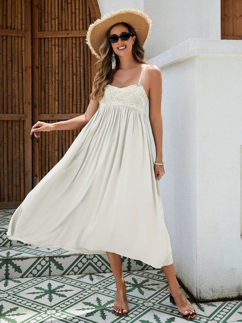 Women's Bohemian Maxi Dress by MANDOTOS featuring breathable rayon fabric, embroidered bust, elastic back, and flowy skirt in black, white, and green.