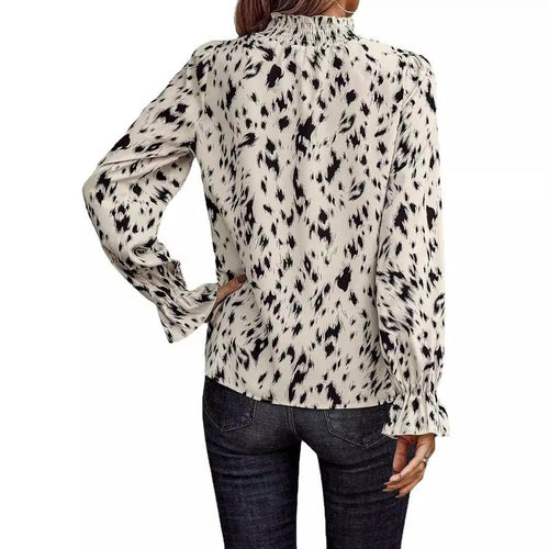 Women's long sleeve turtleneck shirt by MANDOTOS, featuring a fitted design and soft fabric, displayed on a neutral background.