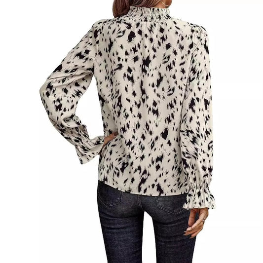 Women's long sleeve turtleneck shirt by MANDOTOS, featuring a fitted design and soft fabric, displayed on a neutral background.