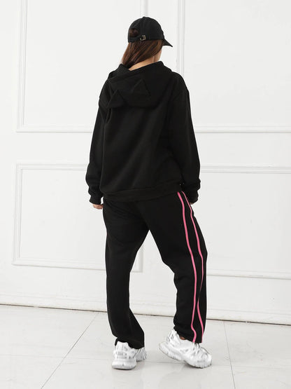Women's long-sleeved hoodie set by MANDOTOS, featuring a comfortable, casual fit with a hood and matching pants.