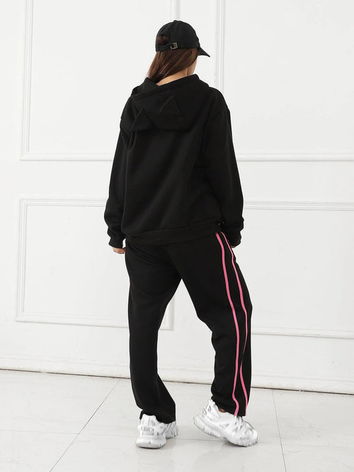 Women's long-sleeved hoodie set by MANDOTOS, featuring a comfortable, casual fit with a hood and matching pants.