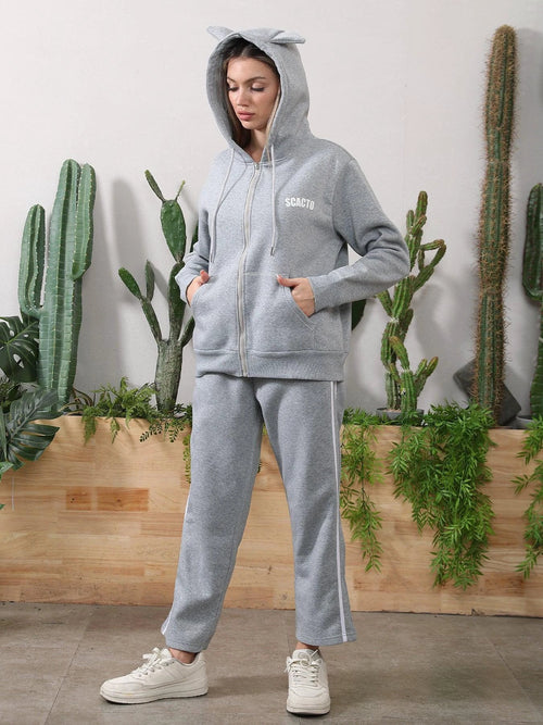 Women's long-sleeved hoodie set by MANDOTOS, featuring a comfortable matching top and pants in a casual, relaxed fit.