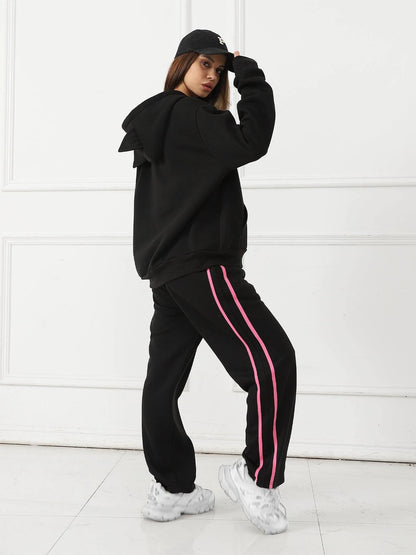 Women's long-sleeved hoodie set by MANDOTOS, featuring a comfortable, casual fit with a hood and matching pants.