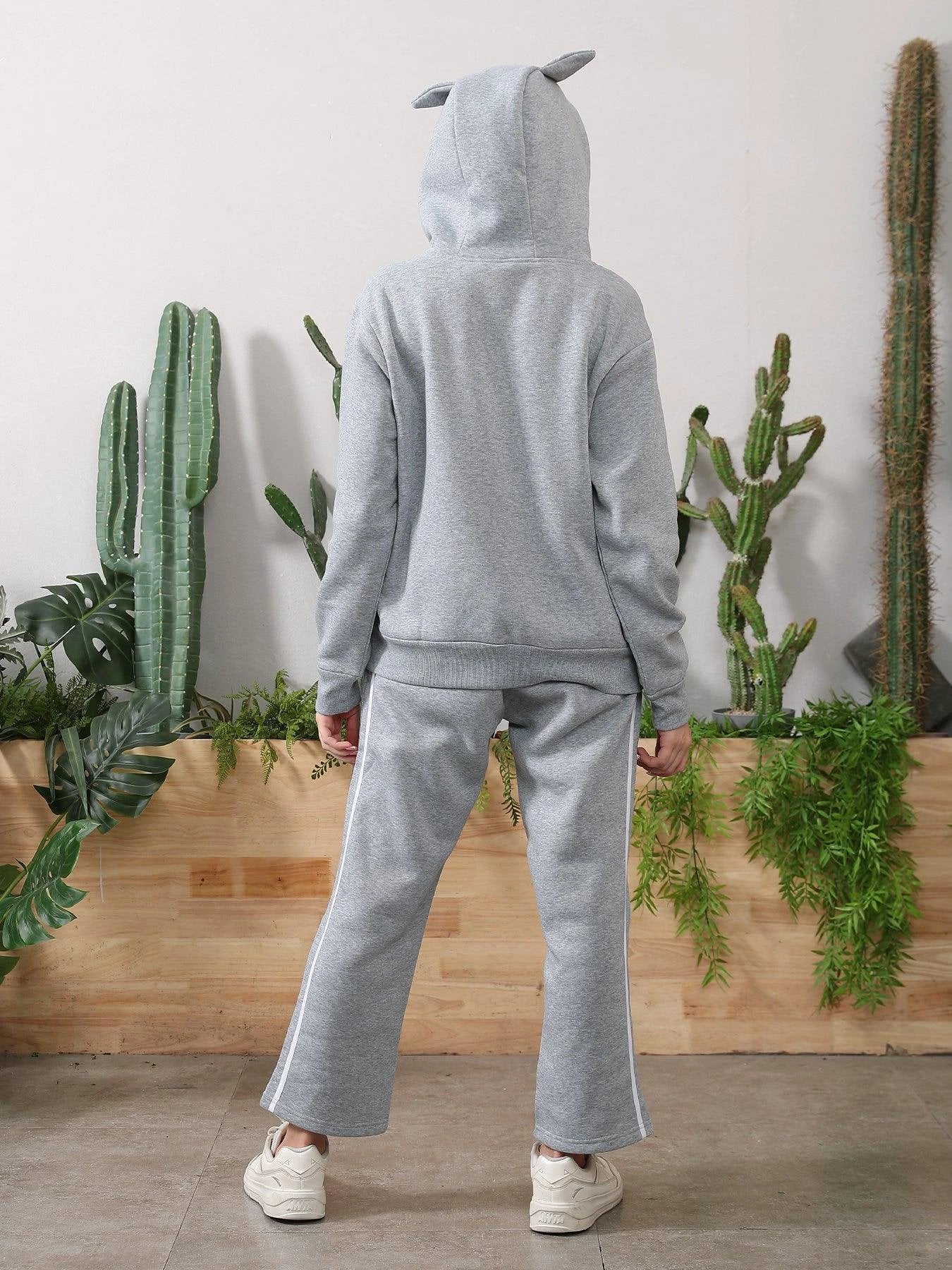 Women's long-sleeved hoodie set by MANDOTOS, featuring a comfortable matching top and pants in a casual style.