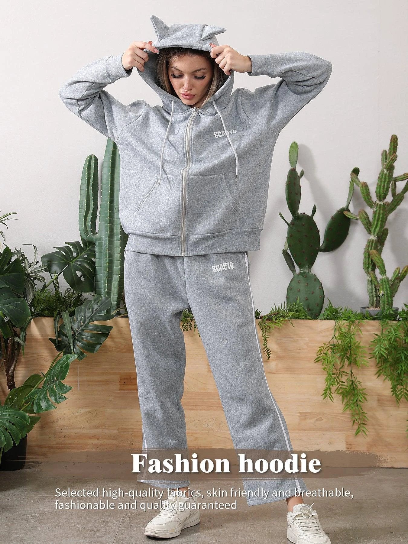 Women's long-sleeved hoodie set by MANDOTOS, featuring a comfortable matching top and pants in soft fabric.