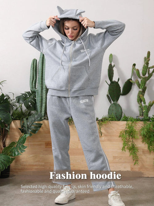 Women's long-sleeved hoodie set by MANDOTOS, featuring a comfortable matching top and pants in soft fabric.