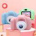 Mandotos X2 HD Mini Cartoon Kids Digital Camera showing colorful cartoon design and compact size for children.