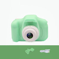 Mandotos X2 HD Mini Cartoon Kids Digital Camera showing colorful cartoon design and compact size for children.