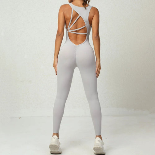 Mandotos women's yoga jumpsuit with V-shaped back, sleeveless design, stretchy fitness and running tights for active wear.