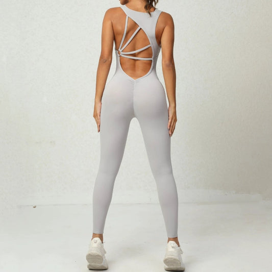 Mandotos women's yoga jumpsuit with V-shaped back, sleeveless design, stretchy fitness and running tights for active wear.