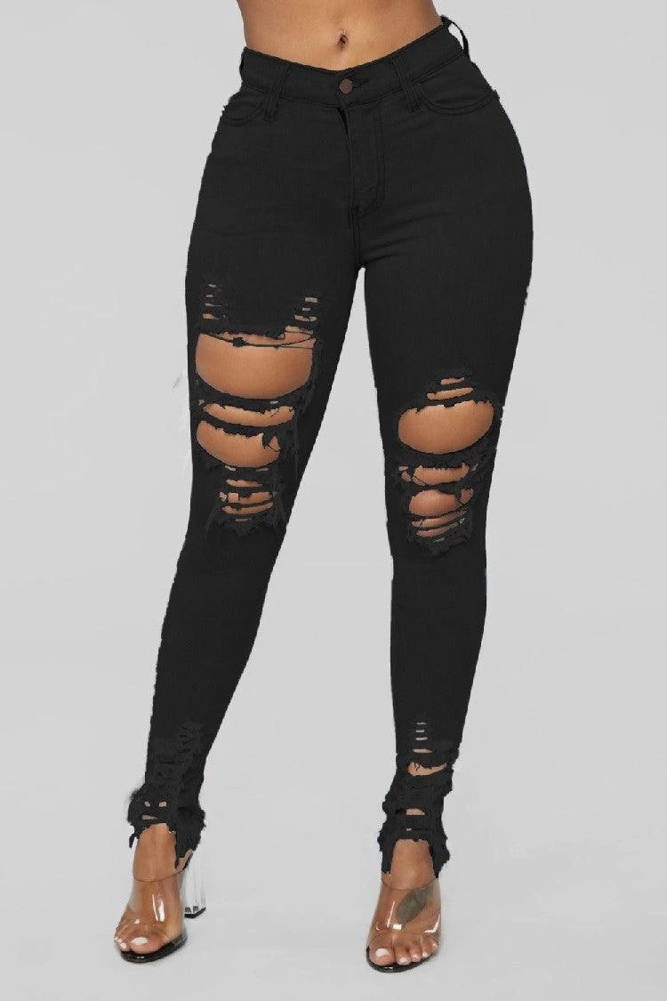 Mandotos women's denim pencil pants with ripped holes, slim fit, long design, and stretch feet for a stylish look.