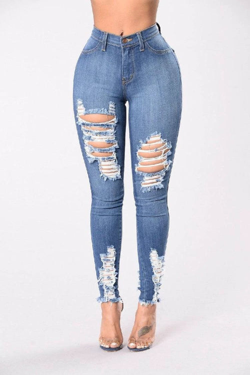 Mandotos denim pencil pants for women, slim fit, long style with ripped holes and stretch feet design.