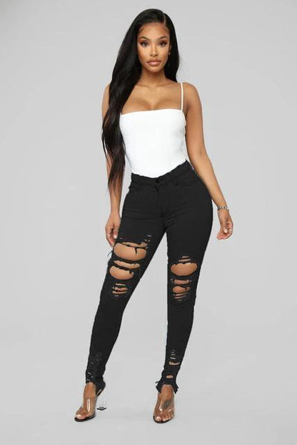 Mandotos denim pencil pants for women, slim long trousers with ripped holes and stretch fabric, featuring tapered legs and fitted style.