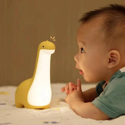 Mandotos Dino Dream Light shaped like a friendly dinosaur, emits a soft glow for a cozy room ambiance.
