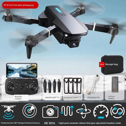 MANDOTOS HD drone for aerial photography, remote control quadcopter with camera, flying outdoors against a blue sky.