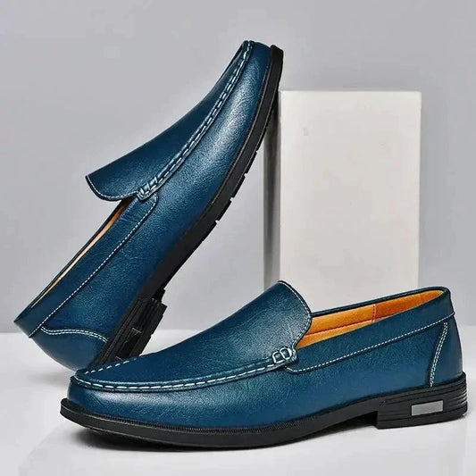 Mandotos Eco-Chic Leather Loafers showing classic slip-on style with sleek leather finish and stitching details.
