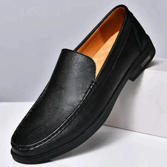 Mandotos Eco-Chic Leather Loafers in brown leather with classic slip-on design and comfortable sole.