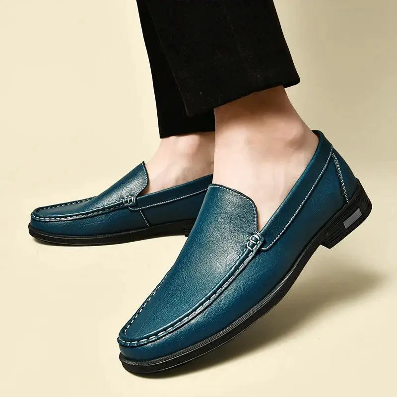 Mandotos Eco-Chic leather loafers showing sleek design and smooth leather finish on a neutral background.
