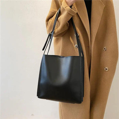 Mandotos eco-friendly vegan leather tote bag with stylish design, featuring sturdy handles and sustainable material.
