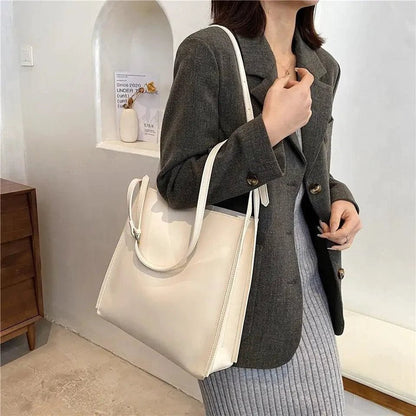 Mandotos eco-friendly vegan leather tote bag with a stylish, sustainable design, featuring spacious interior and modern silhouette.
