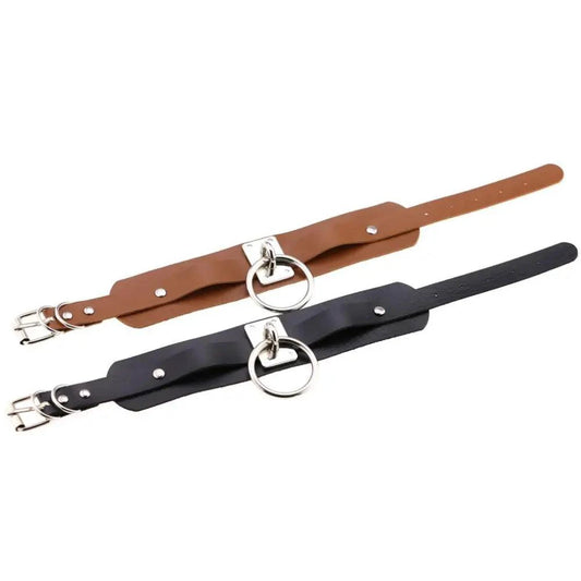 Black edgy leather choker collar with metal accents, designed by MANDOTOS, displayed on a neutral background.