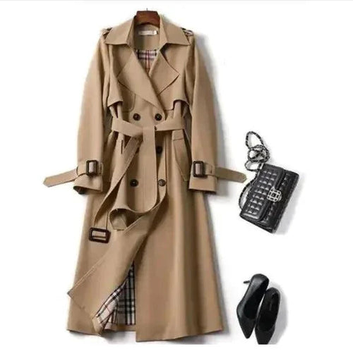 Mandotos Elegant Classic Trench coat displayed on a hanger, showcasing its timeless design and neutral color.