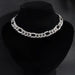 Elegant cubic zirconia Cuban necklace by MANDOTOS featuring sparkling stones and a bold chain design.