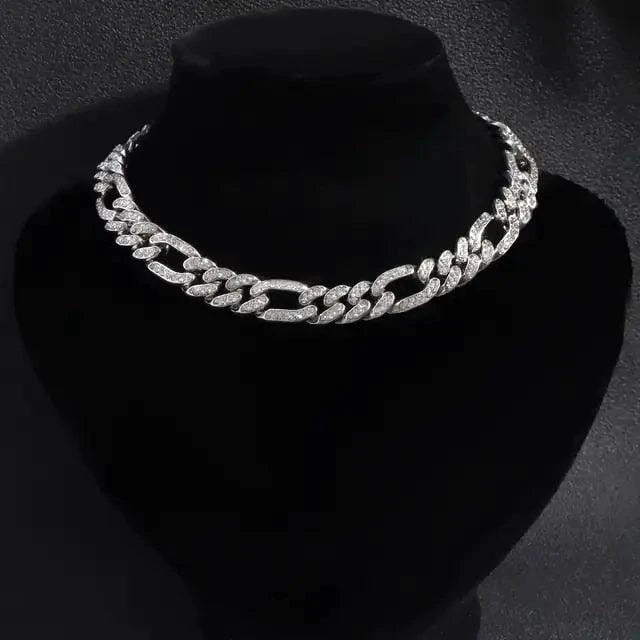 Elegant cubic zirconia Cuban necklace by MANDOTOS featuring sparkling stones and a bold chain design.