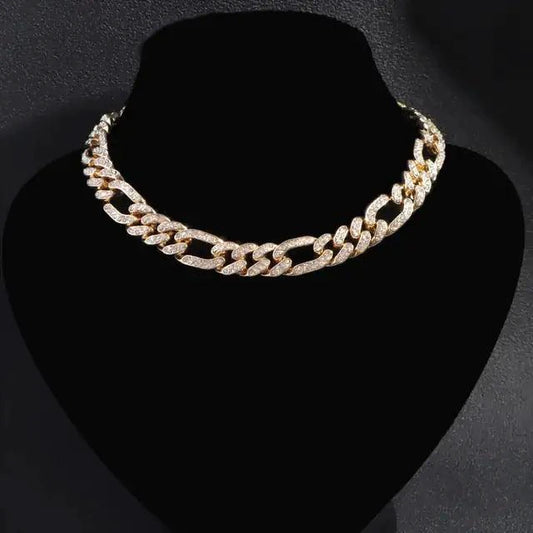 Elegant cubic zirconia Cuban necklace by MANDOTOS featuring sparkling stones and a bold chain design.