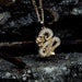 Elegant gold zircon dragon pendant by MANDOTOS featuring detailed dragon design and sparkling zircon accents.