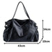 Elegant leather carryall bag by MANDOTOS, showcasing its stylish design and spacious interior for daily use.