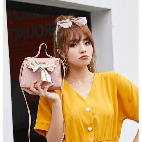 Elegant MANDOTOS leather handbag with matching scarf, stylish and sophisticated accessory set for women.