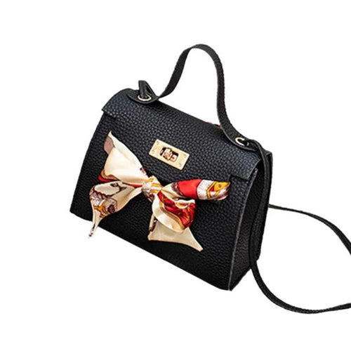 Elegant leather handbag and matching scarf from MANDOTOS, stylish accessories with detailed craftsmanship and sophisticated design.