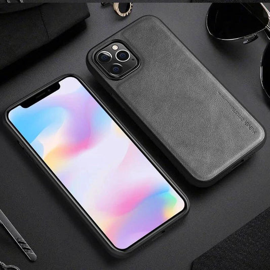 Elegant leather iPhone shield by MANDOTOS, showcasing a sleek, stylish phone case with smooth leather finish and precise cutouts.