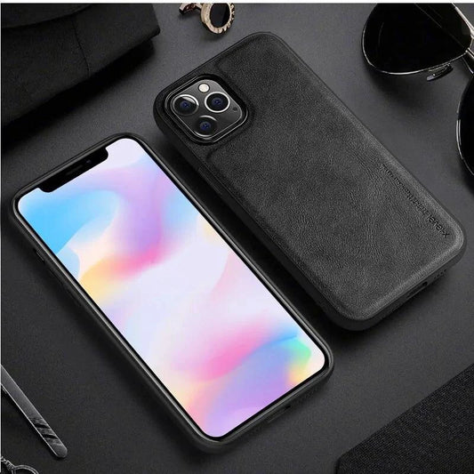 Elegant brown leather iPhone shield case by MANDOTOS with precise cutouts and smooth texture.