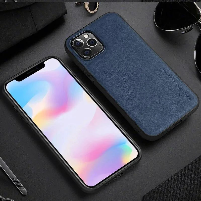 Elegant leather iPhone shield by MANDOTOS showing a sleek, textured leather case with precise cutouts for buttons and camera.