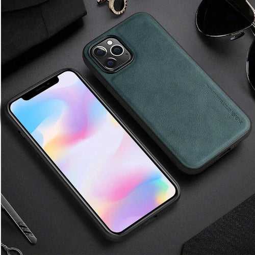 Elegant leather iPhone shield by MANDOTOS featuring a sleek, premium brown leather case with precise cutouts for buttons and ports.