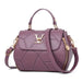 Elegant MANDOTOS leather tote bag with sturdy handles and sleek design, perfect for everyday use.