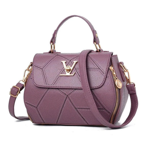 Elegant MANDOTOS leather tote bag with sturdy handles and sleek design, perfect for everyday use.