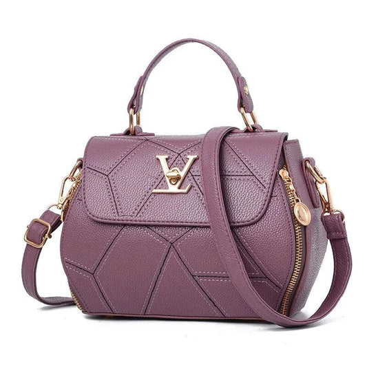 Elegant MANDOTOS leather tote bag with sturdy handles and sleek design, perfect for everyday use.