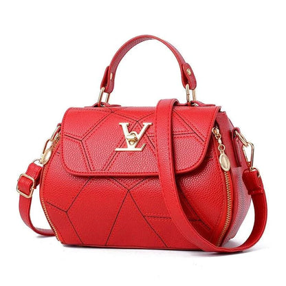 Elegant MANDOTOS leather tote bag with sturdy handles and sleek design, perfect for stylish everyday use.