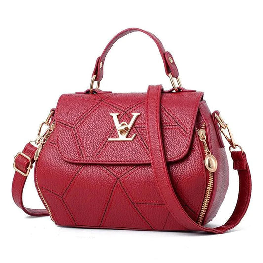 Elegant leather tote bag by MANDOTOS with sturdy handles and sleek design, perfect for everyday use.