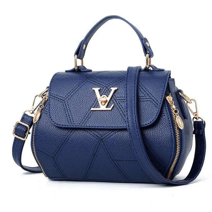Elegant leather tote bag by MANDOTOS, featuring a sleek design with sturdy handles and spacious interior.