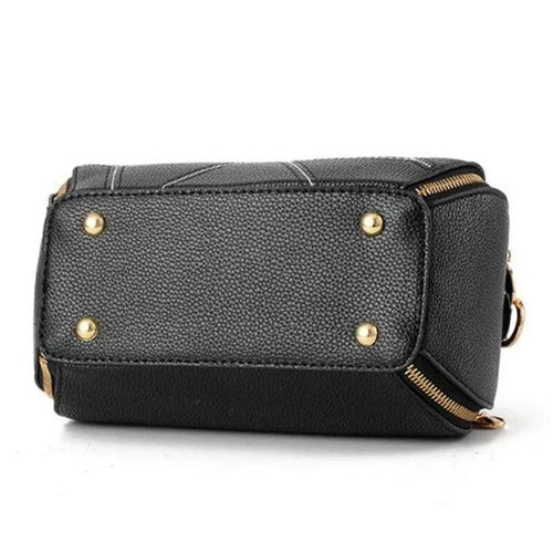 Elegant leather tote bag by MANDOTOS featuring sleek design and sturdy handles, perfect for stylish everyday use.