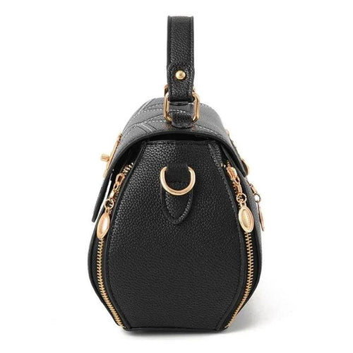 Elegant leather tote bag by MANDOTOS featuring sleek design, sturdy handles, and spacious interior for everyday use.