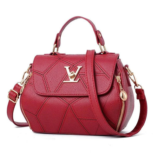 Elegant leather tote bag by MANDOTOS with sturdy handles and sleek design, perfect for stylish everyday use.